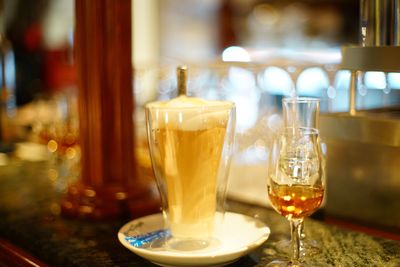 Close-up of beer glass on table