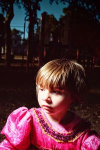 Girl in dress at park