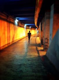 People walking in tunnel