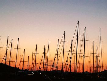 Silhouette of marina at sunset