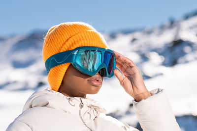 Low angle view of woman wearing hat