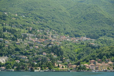 High angle view of townscape by mountain