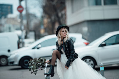 Woman looking away in city