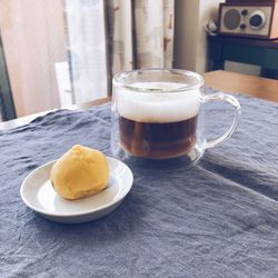 Close-up of coffee served on table