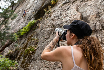 Woman standing on rock