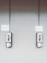 Close-up of electric lamp on wall