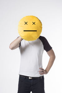 Low section of person standing against white background