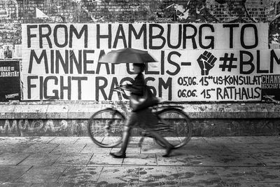 Man riding bicycle on street