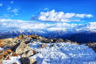 Scenic view of snowcapped mountains against sky