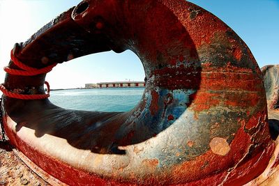 Close-up of wheel against the sky