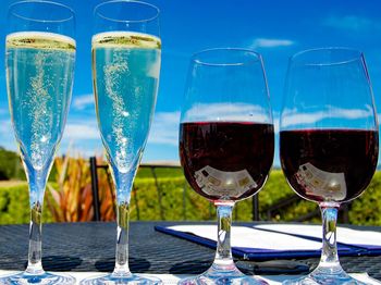 Red wines and champagnes on restaurant table