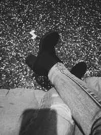 Low section of woman sitting on floor