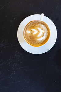 Coffee cup on table