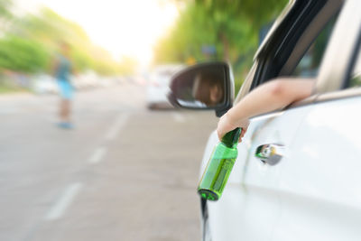 Man driving car on road