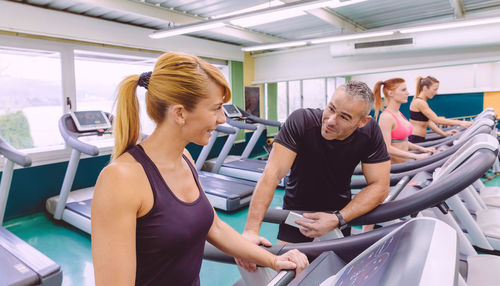 People on treadmills in gym