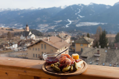 High angle view of breakfast served on table in city