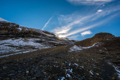 Scenic view of mountains against sky during winter