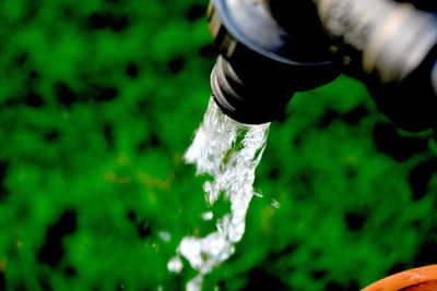 Close-up of water splashing from pipe