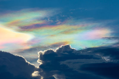 Low angle view of rainbow in sky