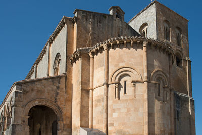 Low angle view of historic building against clear sky