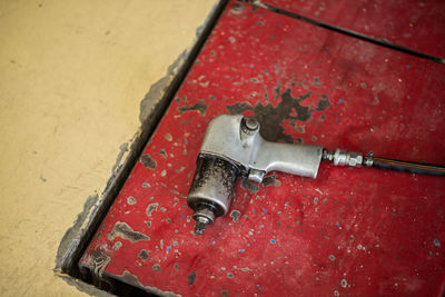 High angle view of old rusty bicycle