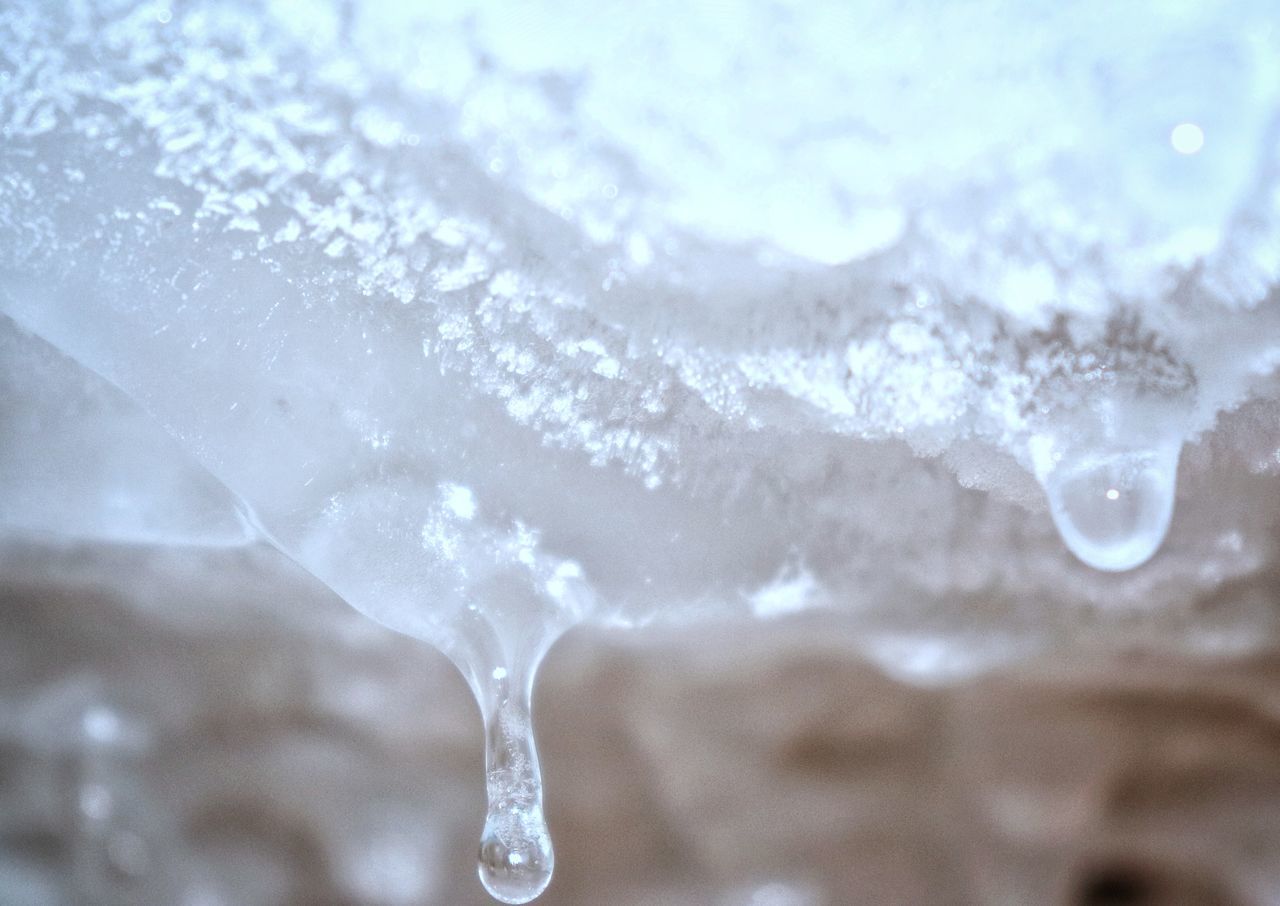 CLOSE-UP OF ICICLES IN SNOW