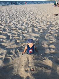 High angle view of boy on beach