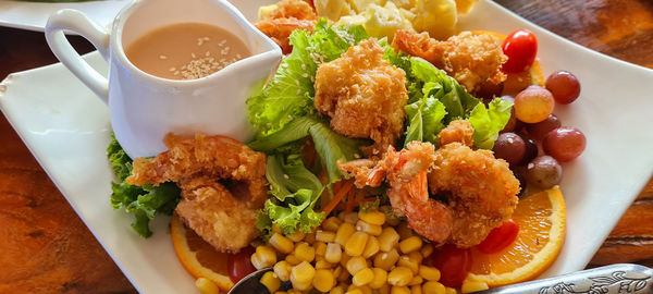 High angle view of breakfast served on table