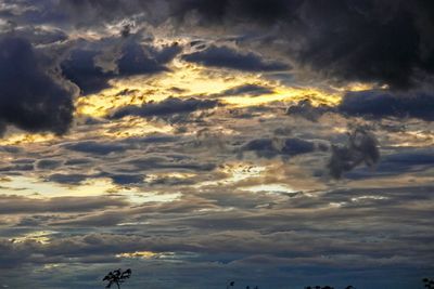 Low angle view of clouds in sky during sunset