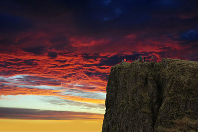 Low angle view of dramatic sky during sunset