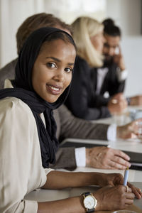 Young woman at business meeting