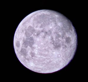 Close-up of moon against clear sky at night