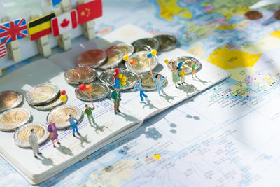 High angle view of coins on table