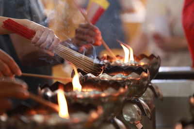 Close-up of burning candle