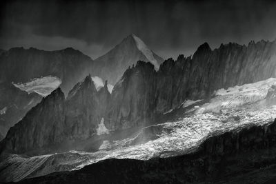 Panoramic view of rocky mountains against sky