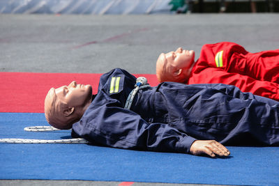Man sleeping on road