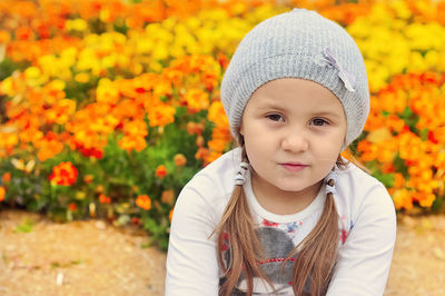 Close-up of cute girl with flowers