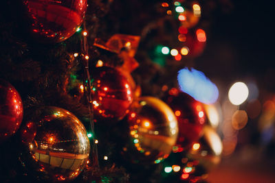 Close-up of illuminated christmas tree at night