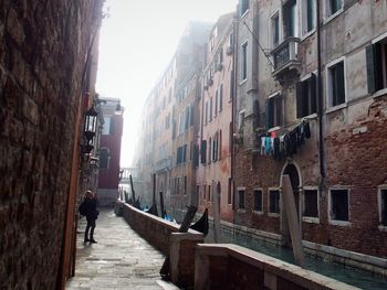 Narrow alley along buildings