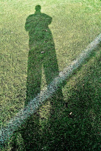 High angle view of man standing on field