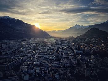 High angle view of townscape against sky during sunset