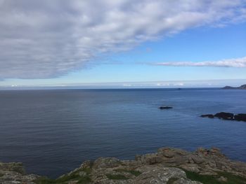 Scenic view of bay against sky