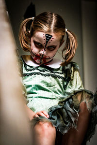Portrait of a scary child at halloween 