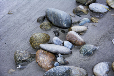 High angle view of stones on beach