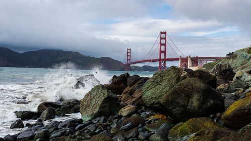 View of suspension bridge over sea