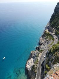 High angle view of road by sea