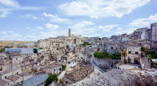 Aerial view of old town against sky