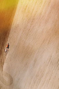 High angle view of people on sand