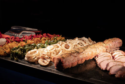 Close-up of meat served on table