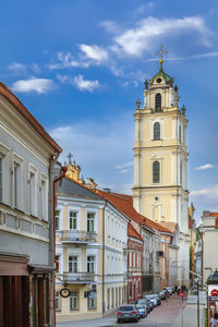 Buildings in city against sky